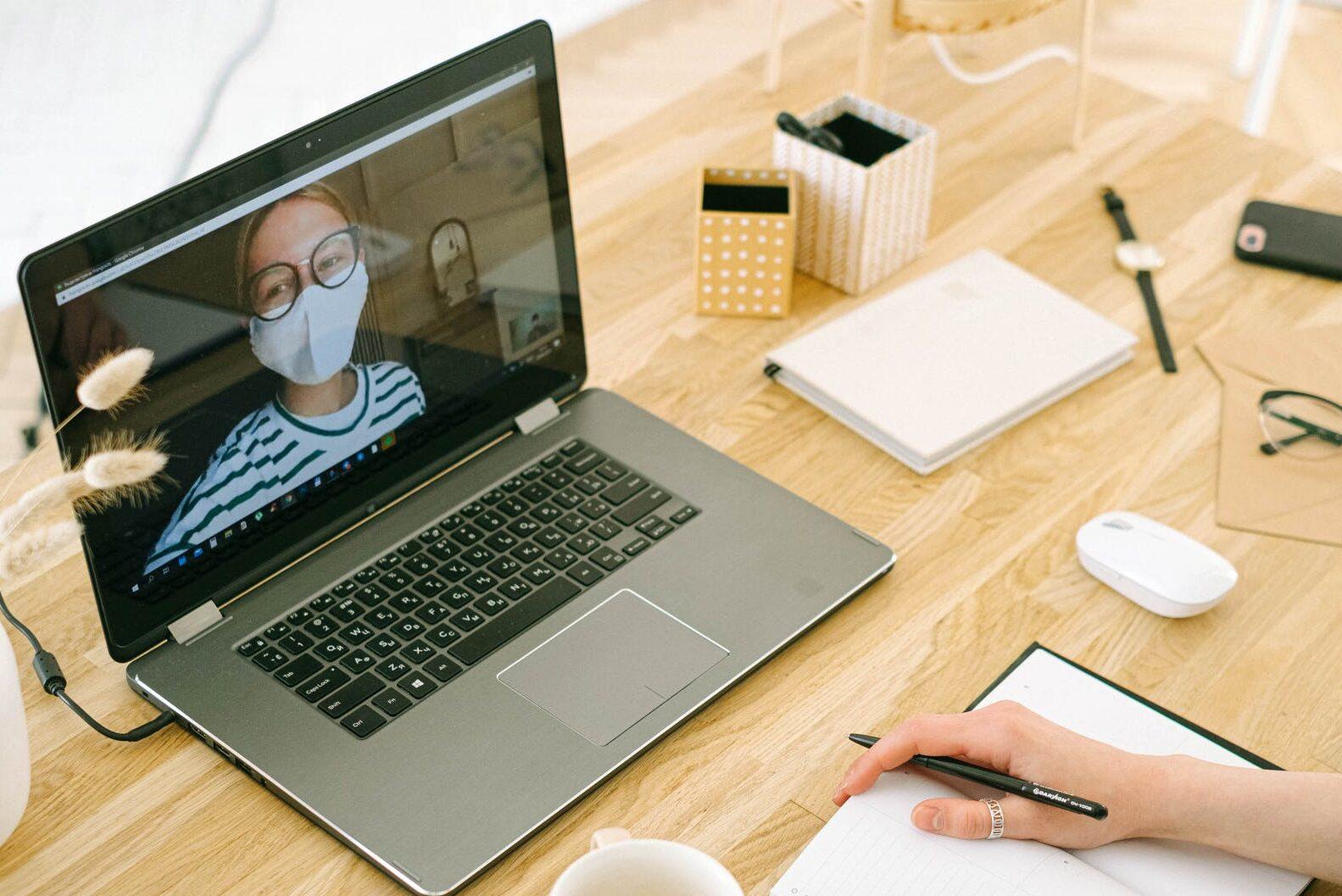 woman having video call in home office